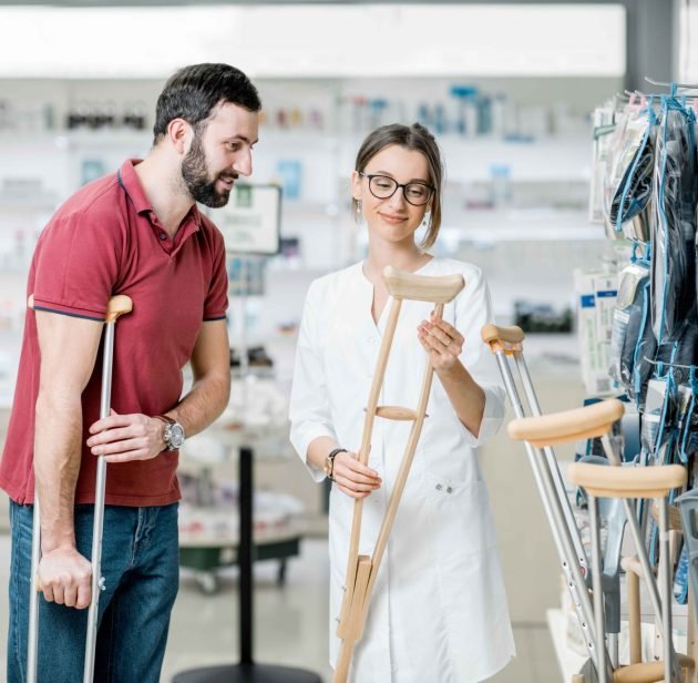 man-choosing-crutches-in-the-pharmacy-2023-11-27-05-05-01-utc_11zon